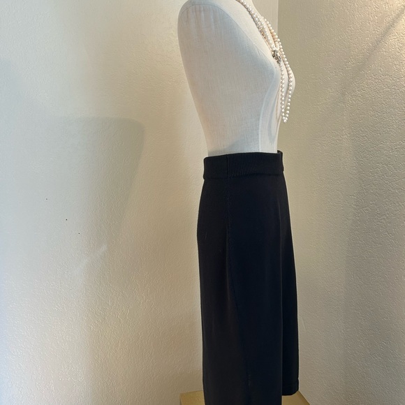 Vintage: CHANEL Black Midi Pencil Skirt 9”waist 26”long. Stretch material.